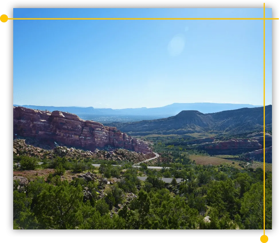 A picture of a valley with mountains in Western Colorado A picture of a valley with mountains in Western Colorado