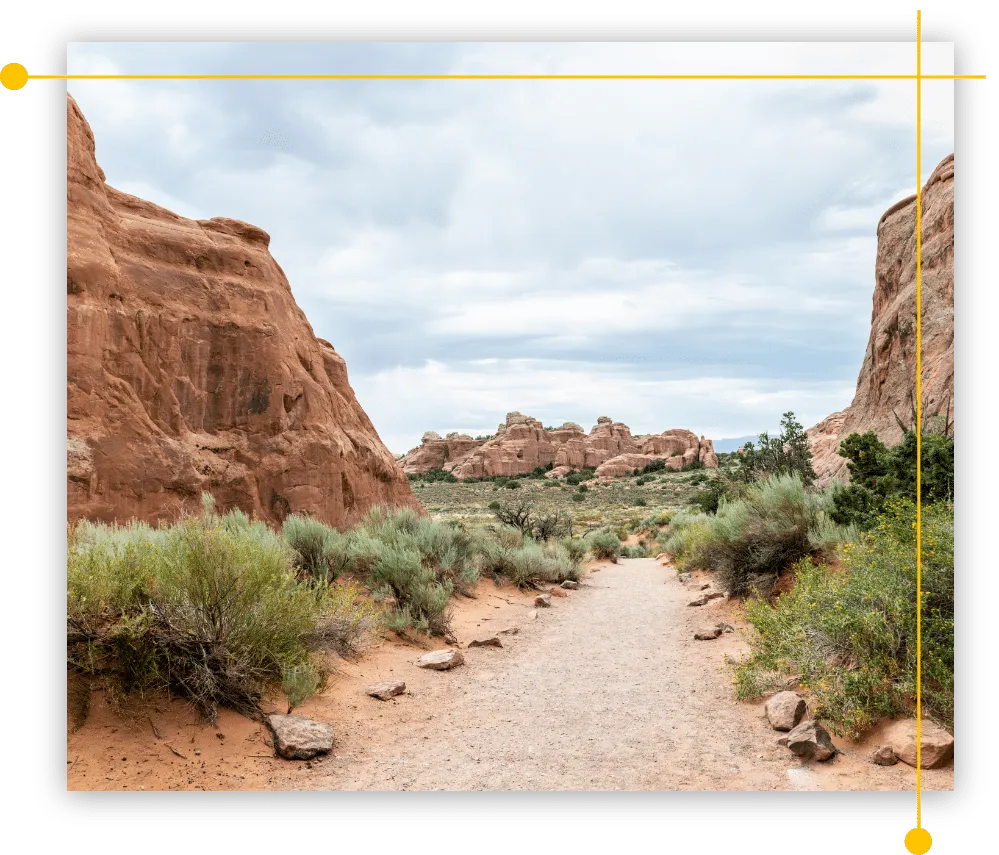 A dirt road going through a canyon in Moab, UT A dirt road going through a canyon in Moab, UT