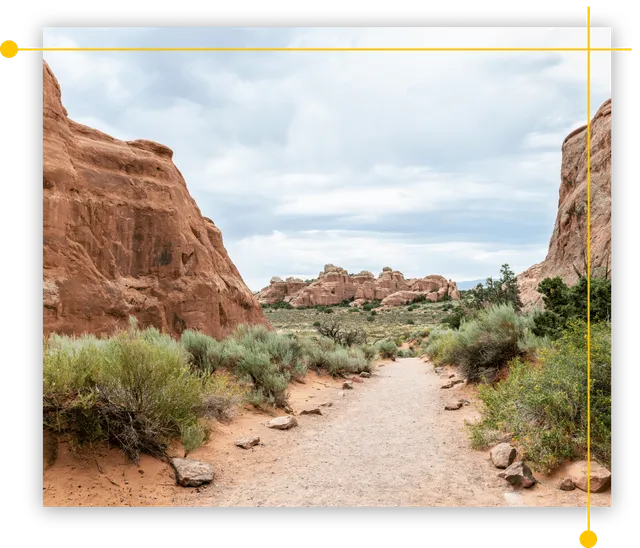 A dirt road going through a canyon in Moab, UT A dirt road going through a canyon in Moab, UT
